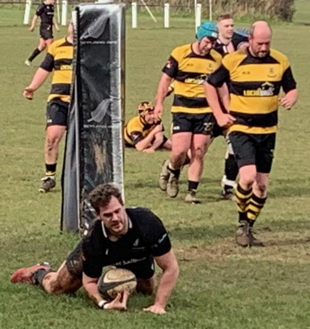 Adam Peel dives over for Neyland